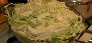 Prepare kielbasa with cabbage