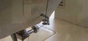 Thread a mechanical Singer sewing machine