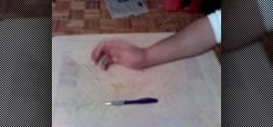Perform the Sonic pen spinning flip trick