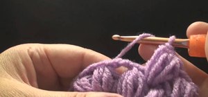 Crochet a puff stitch decrease to make yarn puffs
