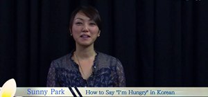 Write and pronounce the Korean words for "I'm hungry"