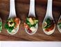 Make caramelized seared scallops with sunchoke purée and herb salad