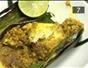 Cook fish wrapped in banana leaf