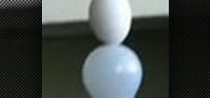 Balance an egg on a light bulb