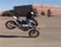 Pull a stoppie trick on a sport bike