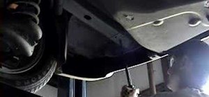 Enlarge a vehicle frame hole for a trailer hitch