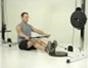 Tone your back with a seated row to chin exercise