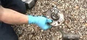 Replace the rear wheel bearings on a Toyota car