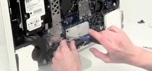 Remove the speaker assembly from a G5 iMac