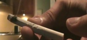Bend a lit cigarette without breaking it