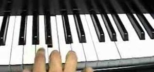 Play the song "The Real Slim Shady" on piano