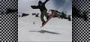 Perform an ollie on a snowboard