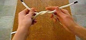 Tie a reef knot (also known as the square knot)