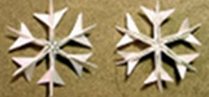 Fold detailed origami snowflakes for creative Christmas decorations