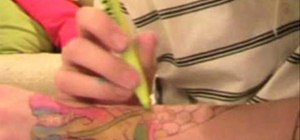 Make a fake tattoo with a ballpoint pen