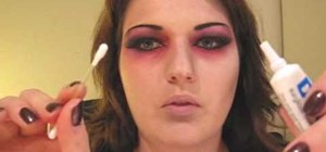 Apply sexy vampire makeup for Halloween