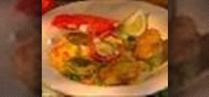 Make lobster and chicken paella