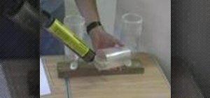Splice two water bottles together to make a large water rocket