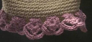 Crochet flower edging on a hat