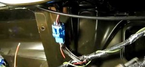 Install a trunk override light switch in a Saturn car