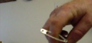 Put a safety pin through your finger w/o pain