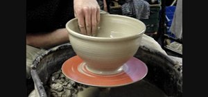Throw a big pottery mixing bowl