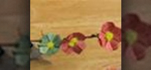 Fold a cherry blossom flower from an origami bird base