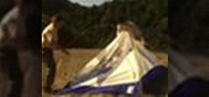 Pitch a tent for a campout as a Boy Scout