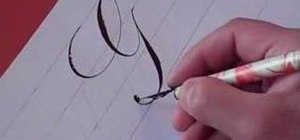 Write the letter G in calligraphy copperplate