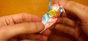 Origami a bird out of a sticky note