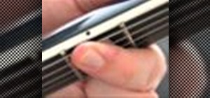 Avoid fret buzz on an electric guitar with techniques