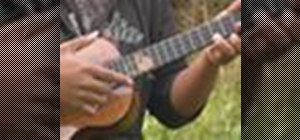 Perform a triple strum on the ukulele