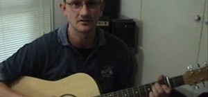 Play "Lola" by The Kinks on acoustic guitar