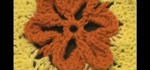 Create an embossed crochet flower using circle to square four