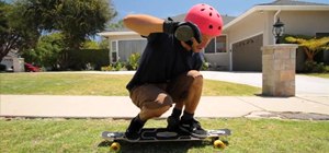 Do an Early Grab trick on your longboard