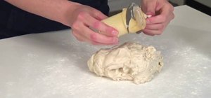 Make thin and crunchy pizza dough and a proscuitto pizza
