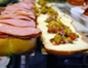 Make a giant muffaletta sandwich out of cold cuts and olive relish