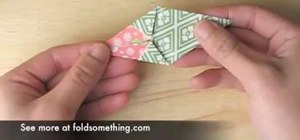Fold an origami Christmas tree ornament