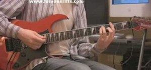 Play "Another Brick in the Wall" on electric guitar