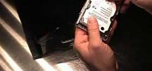 Install a high-capacity hard disk drive in a Sony PS3