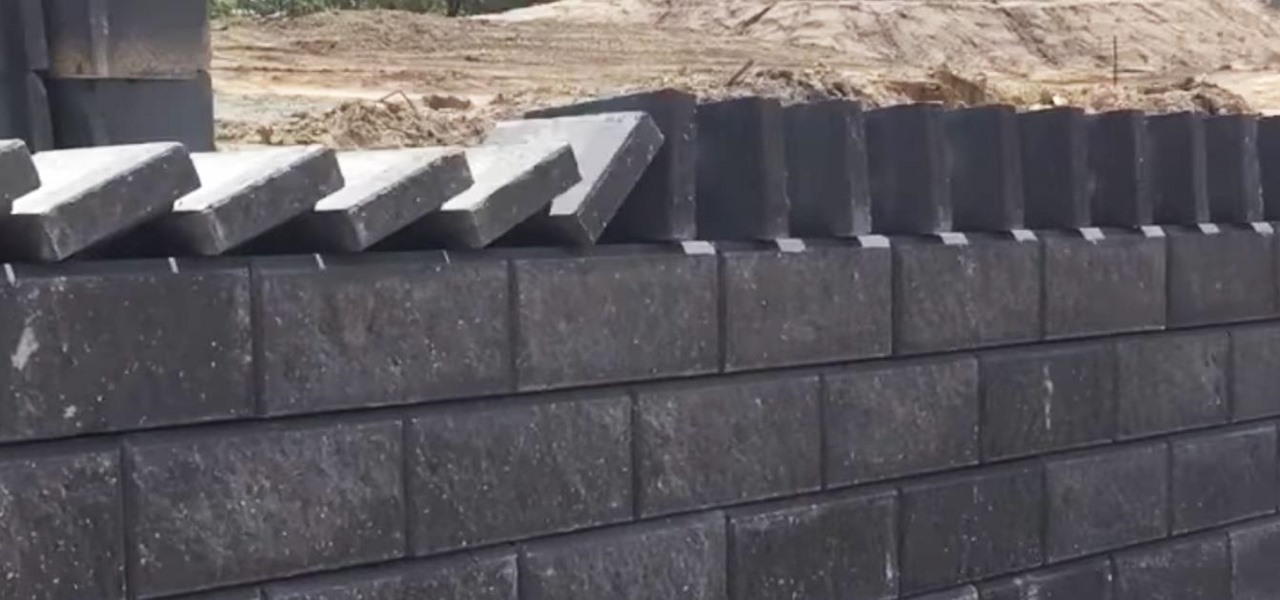 Stone Workers Play Dominoes with Bricks to Create Perfectly-Aligned Wall Cap