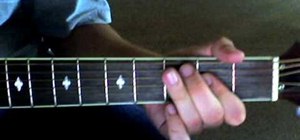 Play Johnny Cash's "Ring of Fire" on acoustic guitar