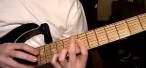 Play chord and melody tapping on the guitar