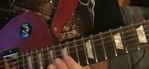 Play the "Bohemian Rhapsody" solo by Queen on guitar