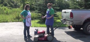 Mow a lawn using a gas powered push lawnmower