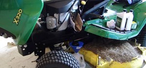 Change the oil on a John Deere X320 lawn mower