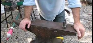 Use an anvil in blacksmithing
