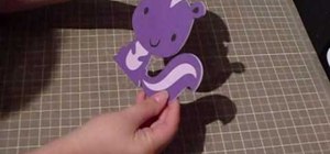 Craft a chubby purple skunk kid's greeting card