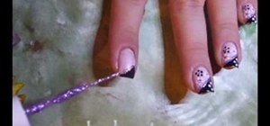 Paint a black & pink French manicure with flowers
