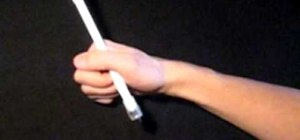Do the Double Thumbaround pen spinning trick
